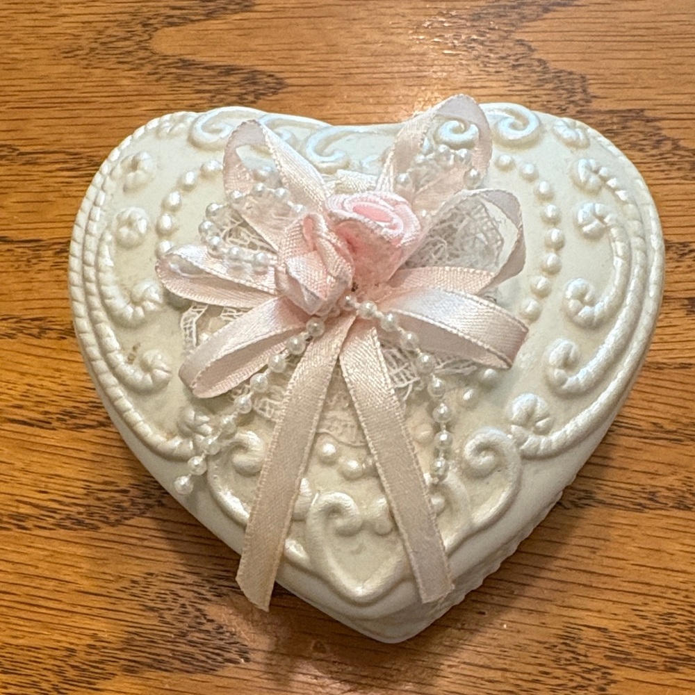 Heart-Shaped White Jewelry Box with Pink Ribbon